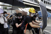 Manifestantes durante las protestas en Hong Kong.-AP / KIN CHEUNG