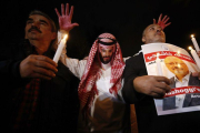 Un activista con la máscara del príncipe saudí.-EMRAH GUREL/ AP