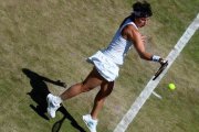Carla Suárez, en acción en segunda ronda de Wilmbledon.-