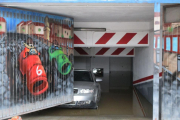 Imagen de un garaje afectado por las avenidas del Ebro.-E. M.