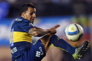 Tévez, en un partido con el Boca Júniors.-EFE / JUAN IGNACIO RONCORONI