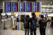 La sala de registros del aeropuerto de Hong Kong.-EFE / EPA / LAUREL CHOR