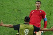 Cristiano Ronaldo celebrando uno de los goles ante España.-LUCY NICHOLSON