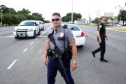 La policía ha rodeado el lugar donde se ha producido el tiroteo.-REUTERS / JOE PENNEY