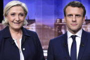 Marine Le Pen y Emmanuel Macron.-ERIC FEFERBERG POOL (AP)