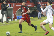 Lance del ecnuentro que ayer disputaron enAnduva el Mirandés y el Sporting de Gijón.-LALIGA