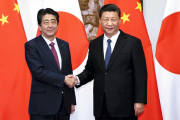 Xi Jinping, presidente de China, y Shinzo Abe, primer ministro de Japón.-AP / LI TAO XINHUA