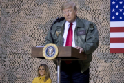 President Donald Trump speaks at a hanger rally at Al Asad Air Base  Iraq  Wednesday   In a surprise trip to Iraq  President Donald Trump on Wednesday defended his decision to withdraw-Andrew Harnik  / AP