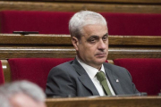 El exconseller de Justícia Germà Gordó, en su escaño del Parlament.-FERRAN SENDRA