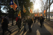 Manifestantes independentistas se dirigen a la concentración convocada por la ANC con motivo de la sesión constitutiva del Parlament.-FERRAN NADEU