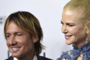 Nicole Kidman y su marido, el cantante Keith Urban,  asisten al estreno de la pelicula  'Leon' en Sidney (Australia), el pasado lunes, 19 de diciembre.-EFE / PAUL MILLER