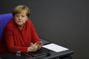 Angela Merkel en el Bundestag.-MARKUS SCHREIBER / AP