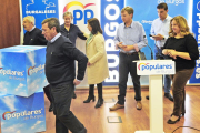 Los populares en su sede tras conocer los resultados de las elecciones nacionales.-ISRAEL L. MURILLO
