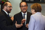 Martin Schulz, François Hollande y Angela Merkel, el pasado 25 de junio en Bruselas.-Foto:   EFE / JULIEN WARNAND