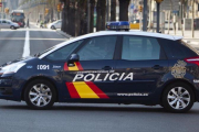 Un coche patrulla de la Policía Nacional.-FERRAN NADEU