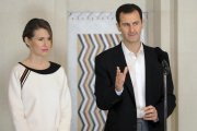 Asma al Asad, junto a su esposo, Bashar.-SANA
