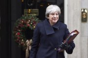 La primera ministra británica, Theresa May, abandonando la residencia gubernamental de Downting Street.-/ AFP / NIKLAS HALLEN (AFP)