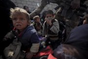 Un grupo de niños refugiados tras huir de la ciudad de Mosul.-RICARD GARCÍA VILANOVA