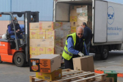 Voluntarios trabajan en la recogida en el Banco de Alimentos de Burgos.-ISRAEL L. MURILLO