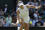Muguruza devuelve una bola-BEN CURTIS