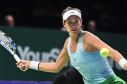 Garbine Muguruza, durante su partido contra Karolina Pliskova en Singapur.-AFP / ROSLAN RAHMAN