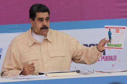 Nicolas Maduro, durante el acto en el que ha anunciado la creación del petro.-SE (EFE)