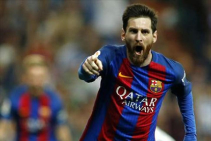 Messi celebra un gol al Madrid en el Bernabéu, esta temporada.-AFP