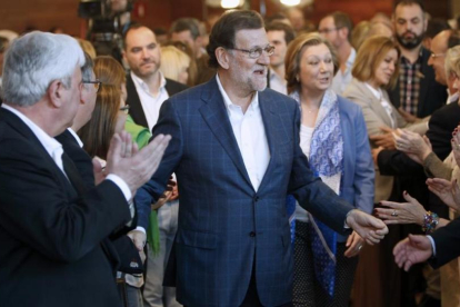 El líder del PP, Mariano Rajoy, en una convención sobre educación de su partido este sábado en Zaragoza.-EFE / JAVIER BELVER