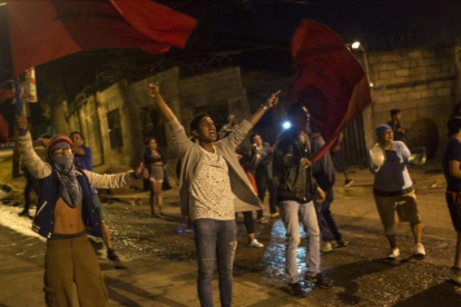 Manifestantes en Tegucigalpa denuncian fraude electoral en Honduras,-/ AP / RODRIGO ABD