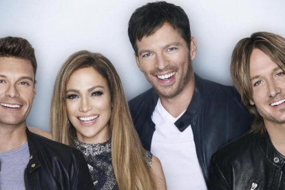 Ryan Seacrest, Jennifer Lopez, Harry Connick Jr. y Keith Urban, presentador y jurados del concurso de talentos 'American idol'.-