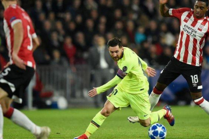 Messi, en el partido contra el PSV.-