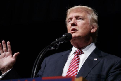 Donald Trump en un acto electoral durante la campaña presidencial.-AP / EVAN VUCCI