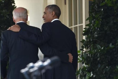 Salientes 8El presidente Barack Obama y el vicepresidente Joe Biden, ayer, en la Casa Blanca.-AFP / NICHOLAS KAMM