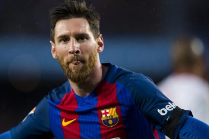 Messi celebra un gol en el último partido de Liga frente al Sevilla.-JORDI COTRINA