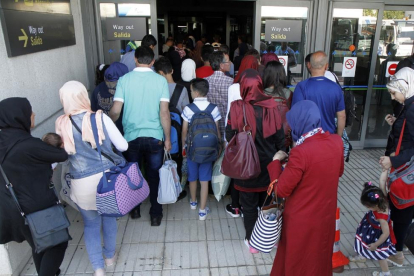 Llegada de 155 refugiados sirios procedentes de Líbano a España en cumplimiento del Programa Nacional de Reasentamiento.-ICAL