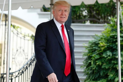 Donald Trump a las puertas de la Casa Blanca.-AFP / YURI GRIPAS