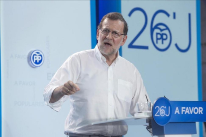 El presidente del Gobierno en funciones y candidato del PP, Mariano Rajoy, durante un mitin.-
