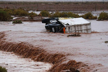 Un diluvio obliga a suspender la etapa de hoy del Dakar.-AFP / FRANCK FIFE