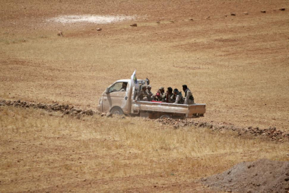 Combatientes a las afueras de Manbech.-REUTERS / RODI SAID