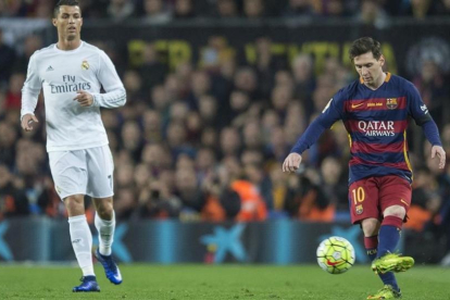 Cristiano y Messi en el Camp Nou.-
