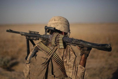 Un marine estadounidense, de regreso a su base en la provincia de Helmand (Afganistán), en el 2011.-AP / DAVID GOLDMAN