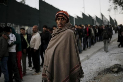 Refugiados en el campamento de Moria, en Grecia.-REUTERS