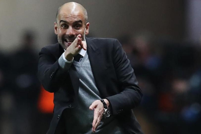 Pep Guardiola, durante la derrota del Manchester City ante el Mónaco.-AFP / VALERY HACHE