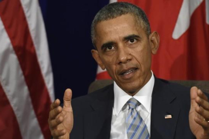 Obama habla con la prensa durante su reunión con el primer ministro de Canadá, en Manila, este jueves.-AP / SUSAN WALSH