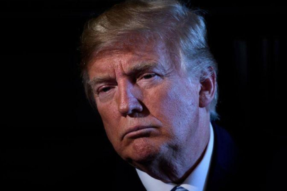 El presidente Donald Trump ha aplicado este jueves aranceles del 25% a China.-BRENDAN SMIALOWSKI (AFP)