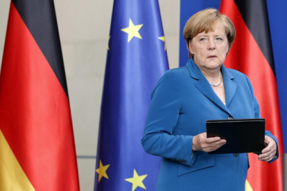 Merkel en la comparecencia de este sábado por la matanza de Múnich.-MICHAEL SOHN / AP
