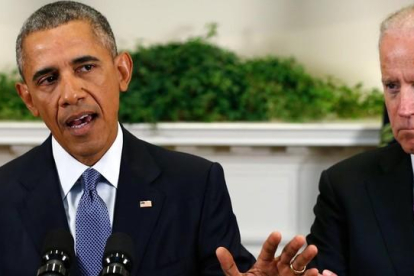 Obama habla junto al vicepresidente Joe Biden, en la Casa Blanca, este jueves.-REUTERS / JONATHAN ERNST