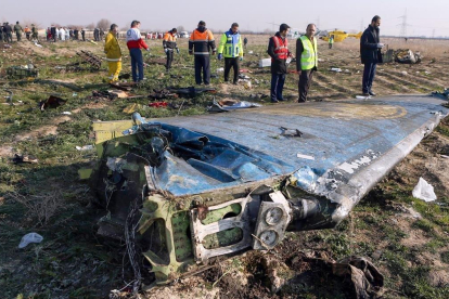 No hay supervivientes en el fatídico accidente aéreo en Irán.-AFP / AKBAR TAVAKOLI
