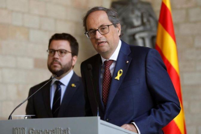 Quim Torra y Pere Aragonès, en la rueda de prensa conjunta que han ofrecido este viernes.-TONI ALBIR (EFE)