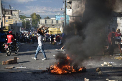 Las protestas sociales en Haití aumentan de intensidad.-HECTOR RETAMAL / AFP